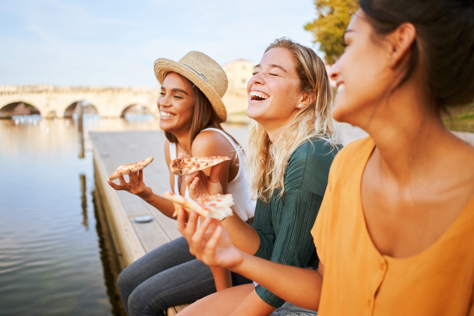 Friends enjoying a flammekueche outdoors