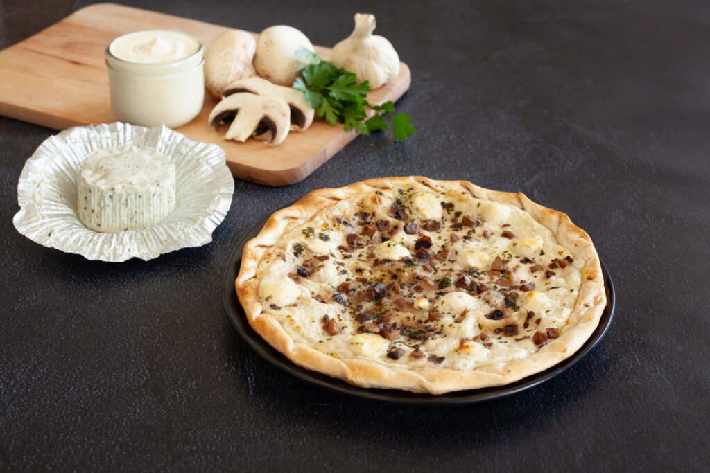 Tarte fine au Boursin ail et fines herbes et aux champignons de Paris